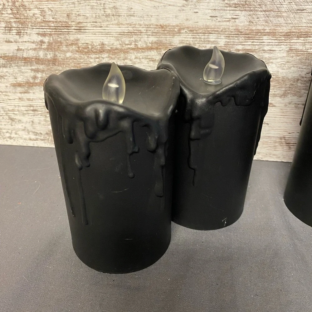 Set of 4 black battery powered candles brand new from Target